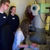 Visiting pupils use the Unit’s electron microscope to view the synapses made by nerve cells.